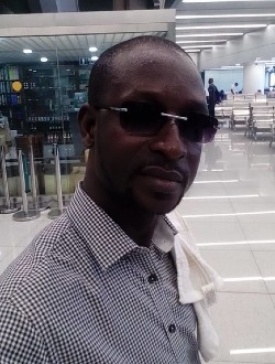Carlos's profile, a single 35-year-old a man in Lomé