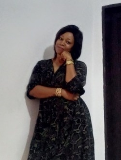 Carine's profile, a single 35-year-old a woman in Abang II