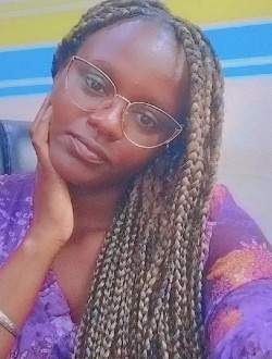 Esther's profile, a single 36-year-old a woman in Abombo