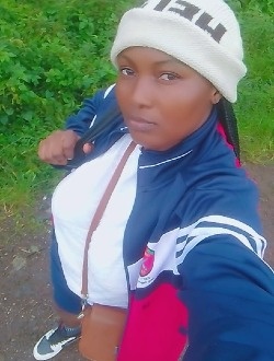 Kérine's profile, a single 35-year-old a woman in Abé