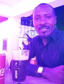 Chris's profile, a single 52-year-old a man in Lomé