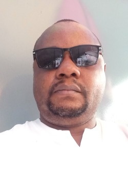 Claude's profile, a single 47-year-old a man in Kinshasa