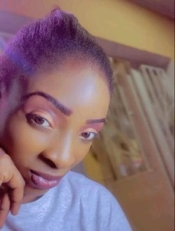 Divina's profile, a single 30-year-old a woman in Kinshasa