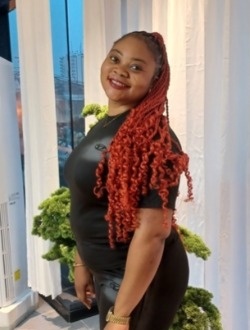 Brenda's profile, a single 30-year-old a woman in Douala