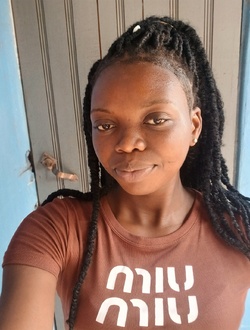 Marie's profile, a single 22-year-old a woman in Adido Gomé