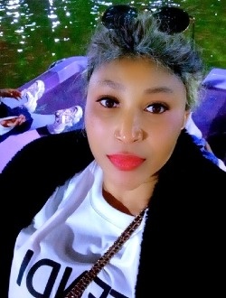Angela's profile, a single 41-year-old a woman in 'Aïn Beïda