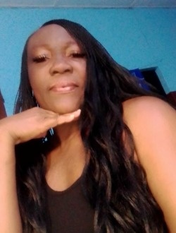 Emilie's profile, a single 46-year-old a woman in Lomé