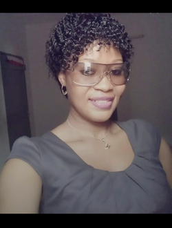 Nadine's profile, a single 33-year-old a woman in Lomé