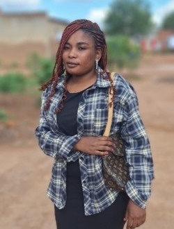 Emily's profile, a single 26-year-old a woman in Lubumbashi