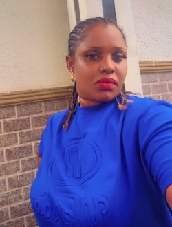 Diane's profile, a single 37-year-old a woman in Lagos