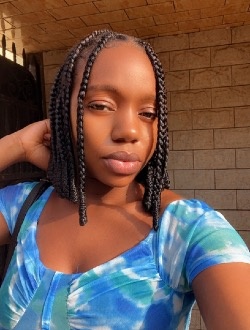 Lucy's profile, a single 30-year-old a woman in Douala