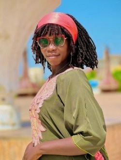Carine's profile, a single 29-year-old a woman in Abadji