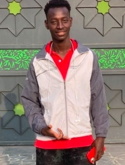 Mamadou's profile, a single 23-year-old a man in Abidjan
