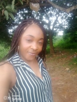 Carine's profile, a single 39-year-old a woman in Abang II