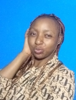 Flore's profile, a single 31-year-old a woman in Abang
