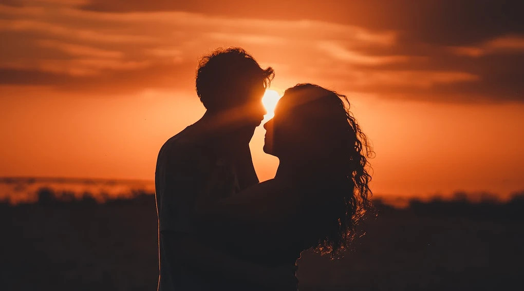 Couple in love at sunset